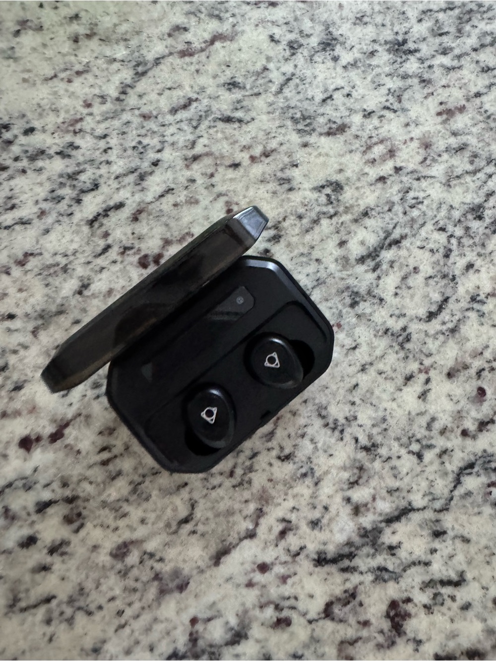 Black Wireless Earbuds in Charging Case